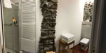 Seashell studio, double bed and window on the Ligurian coast